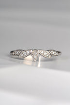 delicate diamond set platinum wedding ring with petal floral design, made in the UK