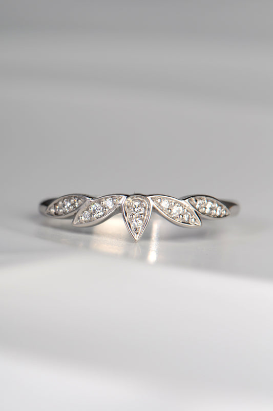 delicate diamond set platinum wedding ring with petal floral design, made in the UK