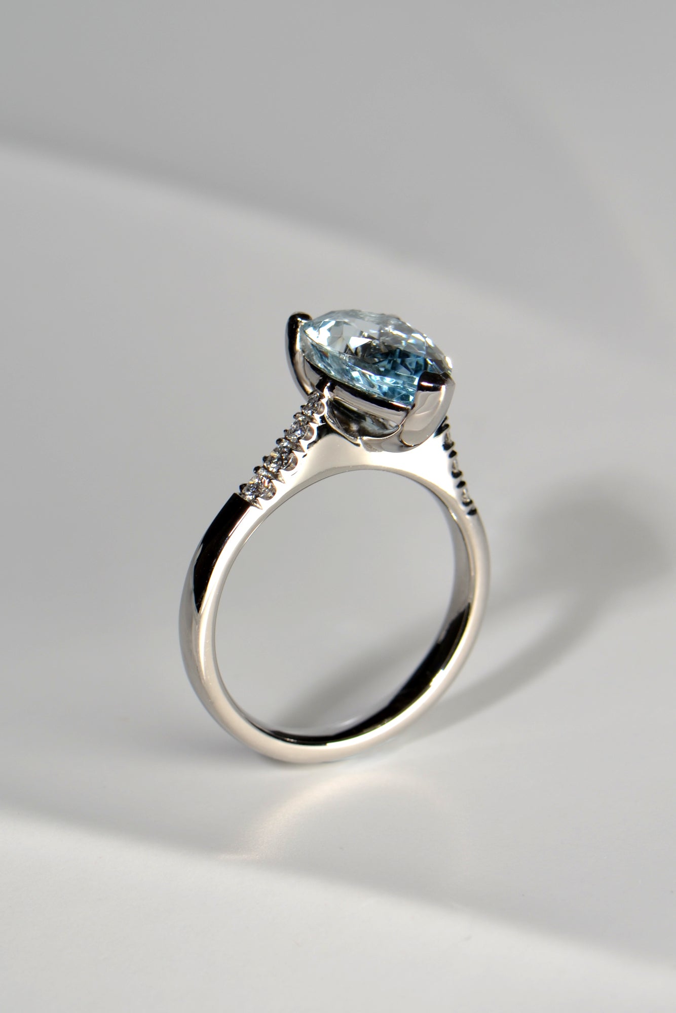 Aquamarine pear cut diamond platinum ring