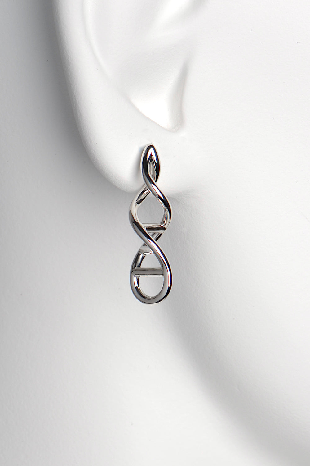 unusual silver drop earrings inspired by DNA double helix exclusively available from jewellery designer Christine Sadler who is based in Ayr Scotland. The perfect gift for a family member or biologist.