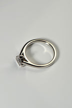 view of the trillion cut sailing stone ring from the claw side
