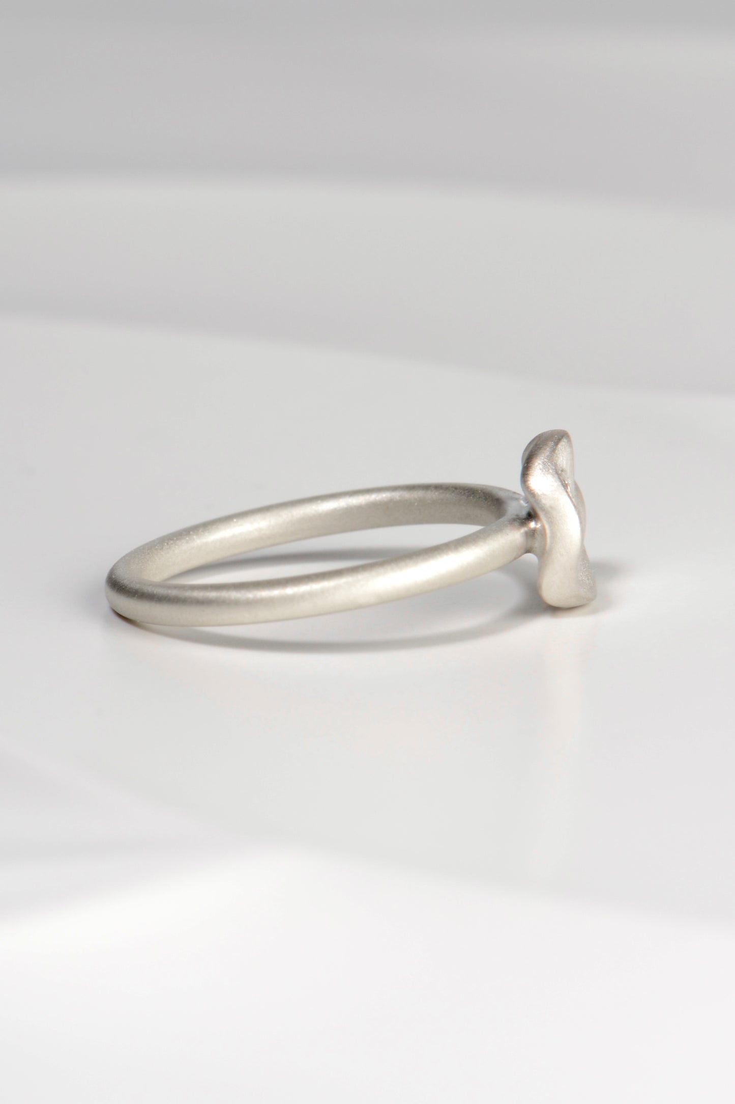 modern delicate brushed silver designer ring with a diamond exclusively available from Christine Sadler