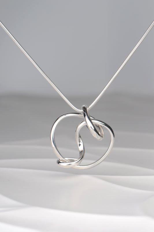 large silver handmade knot necklace exclusively available from Christine Sadler