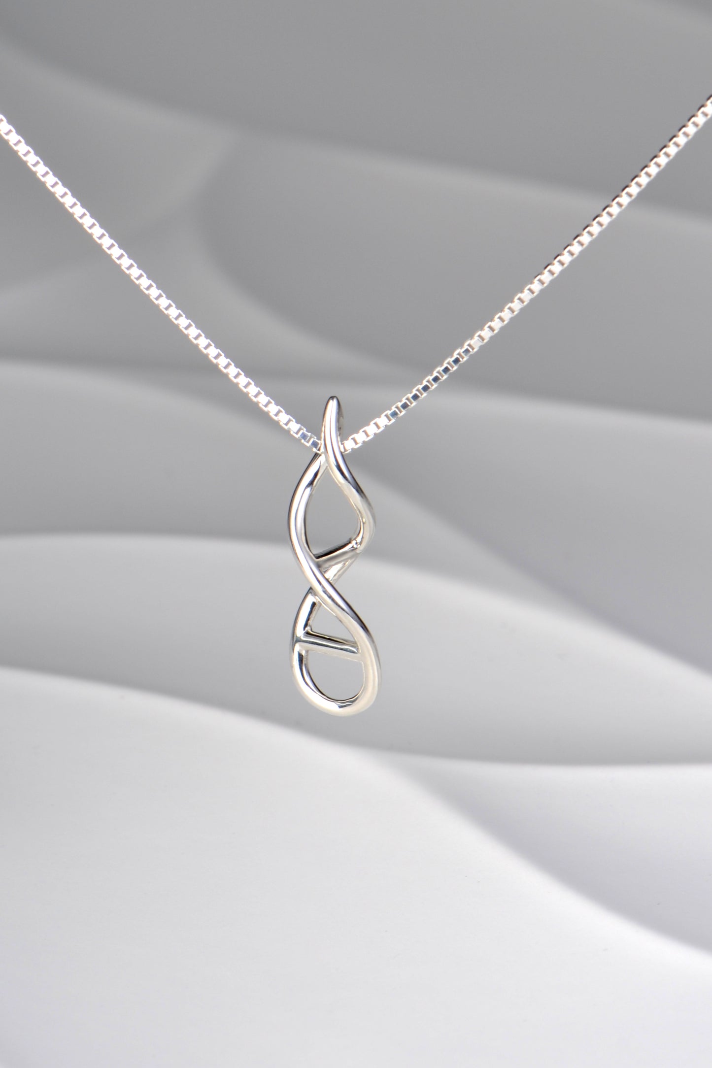 Designer Genes silver pendant