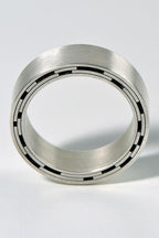 modern silver ring for a man inspired by star trails by British jewellery designer Christine Sadler