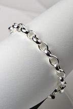 chunky silver T bar bracelet for a woman