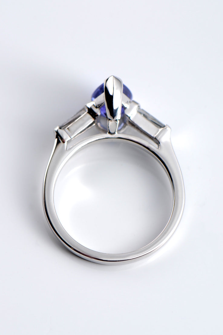 Pear shaped tanzanite and diamond white gold ring