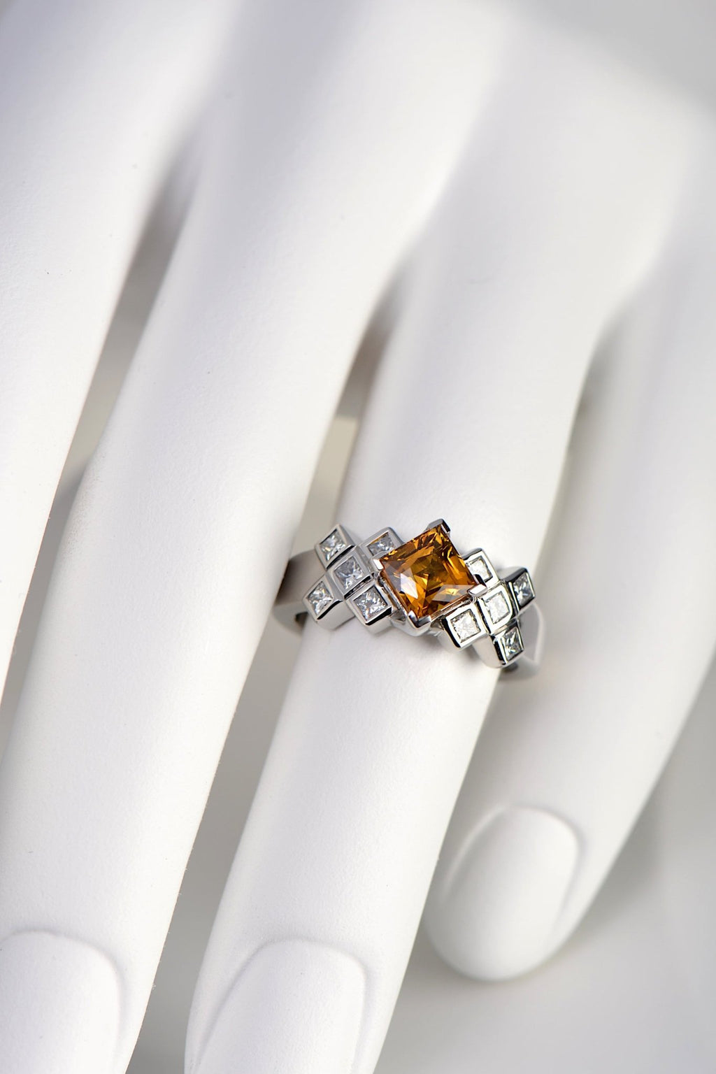 Orange Sapphire and Diamond scottish engagement ring by jewellery designer Christine Sadler who lives in Scotland