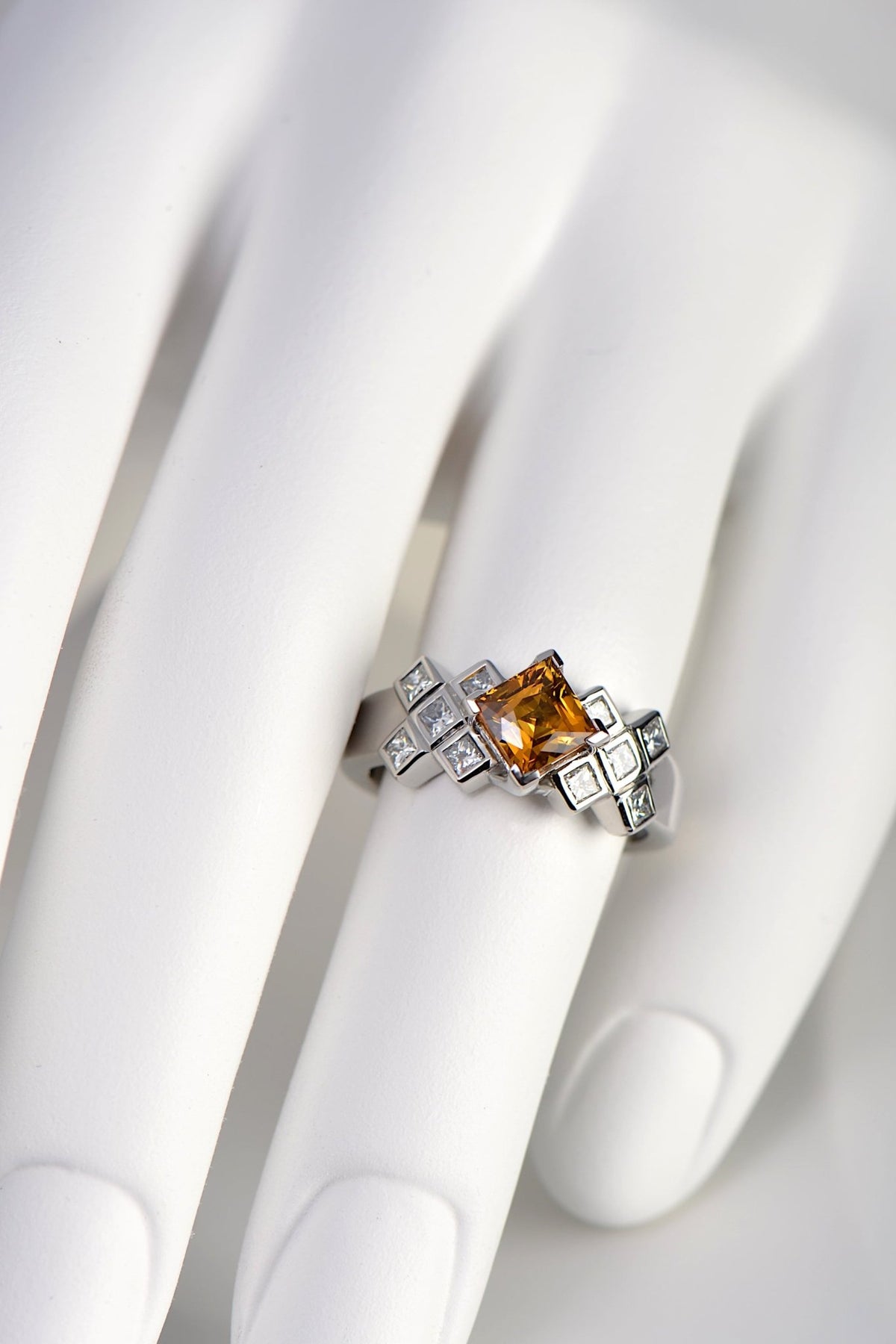 Orange Sapphire and Diamond scottish engagement ring by jewellery designer Christine Sadler who lives in Scotland