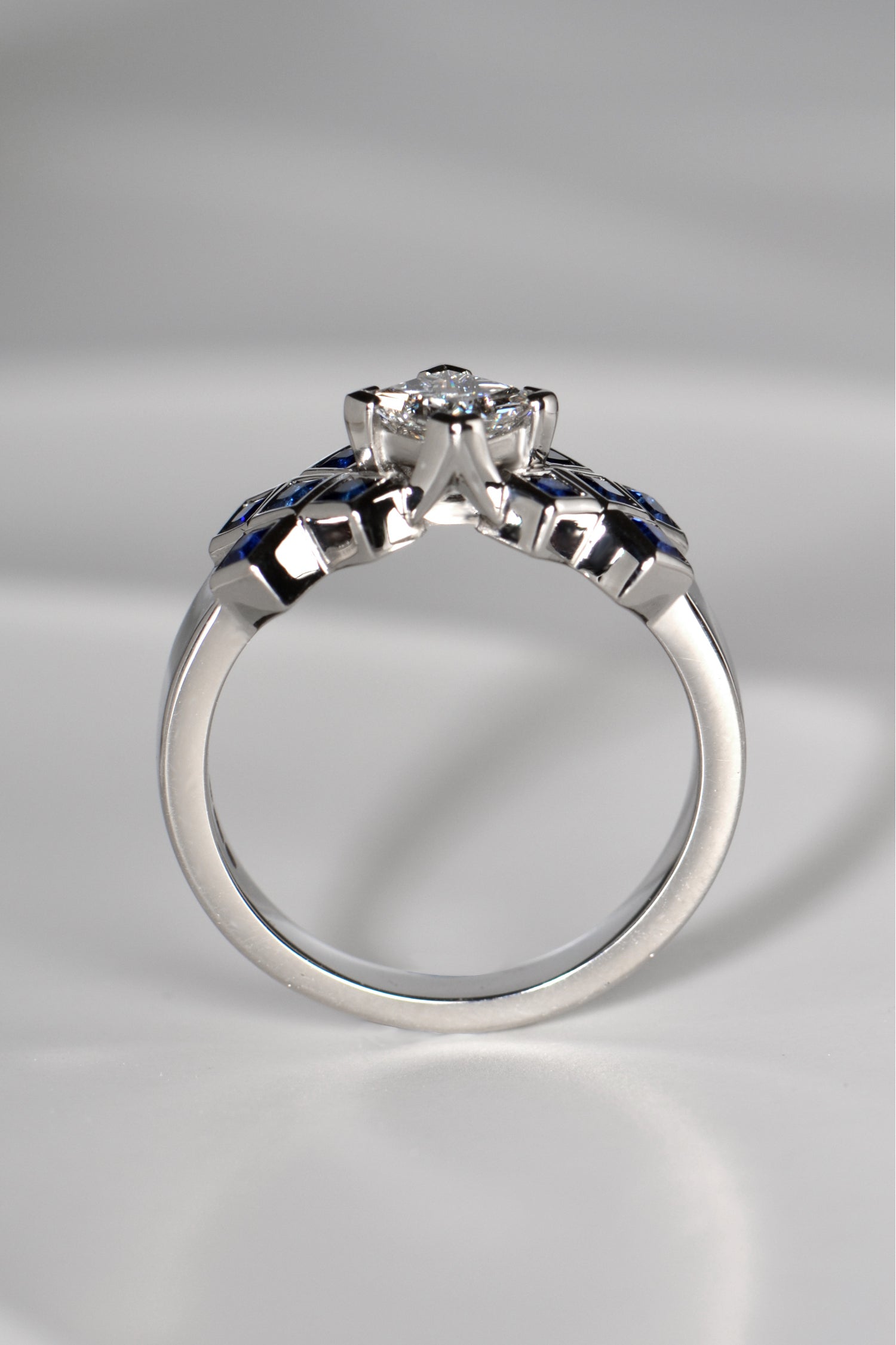 The diamond in the tartan ring is set higher than the sapphires so it looks like a rock rising out of a sapphire sea.This Scottish diamond ring design is available exclusively from Christine Sadler.