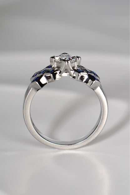 The diamond in the tartan ring is set higher than the sapphires so it looks like a rock rising out of a sapphire sea.This Scottish diamond ring design is available exclusively from Christine Sadler.