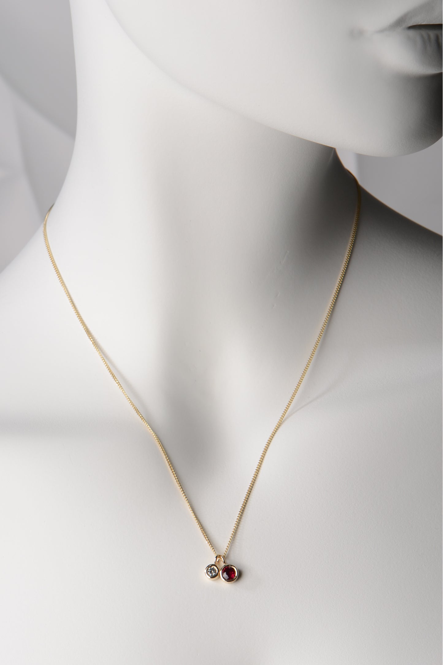 Ruby and diamond gold Cairn necklace