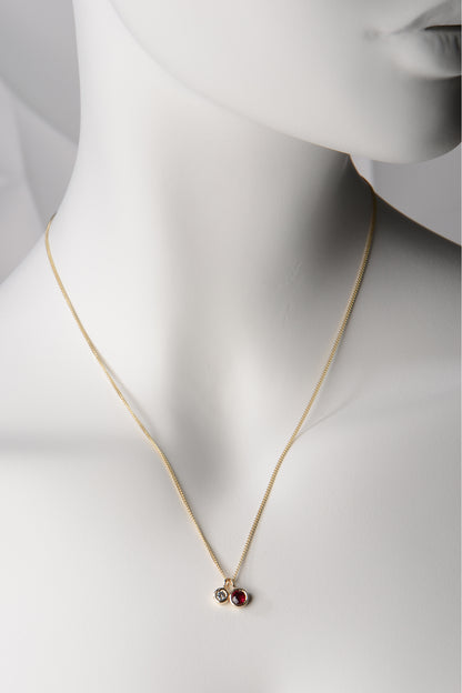 Ruby and diamond gold Cairn necklace