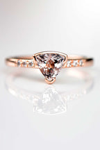 Morganite trillion diamond rose gold ring called Sailing Stones by contemporary jewellery designer Christine Sadler