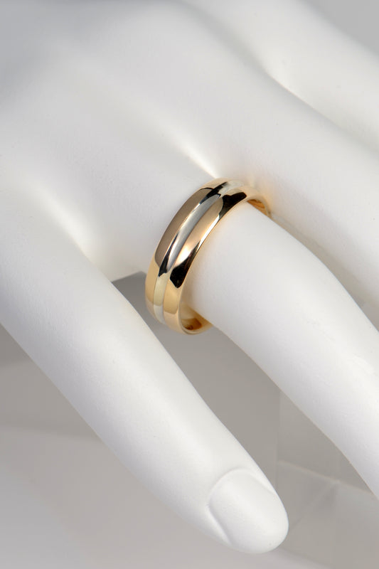 modern gent's wedding ring with two colours of gold designed and made in the UK
