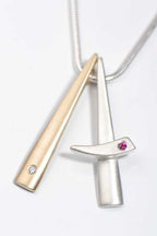 modern handmade Cairn 9ct gold and silver ruby and diamond pendant by Scottish jewellery designer Christine Sadler