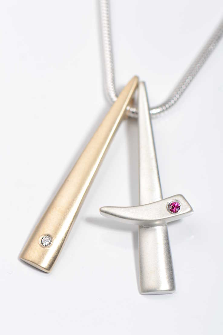 modern handmade Cairn 9ct gold and silver ruby and diamond pendant by Scottish jewellery designer Christine Sadler