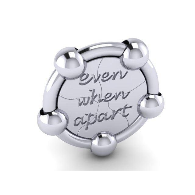 ring that moves with engraving that says "together forever, even when apart" a unique ring design from UK jewellery designer Christine Sadler