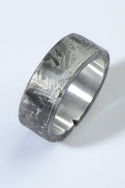 Unique silver ring that is textured and oxidised for a man or woman from British jewellery designer Christine Sadler's Hero collection